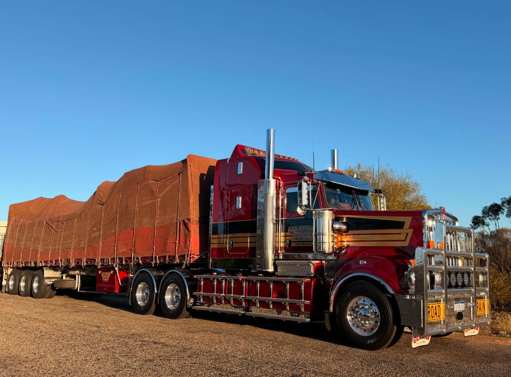 G&S Hannah Transport road train on the open road during a Perth to Brisbane interstate machinery haul.