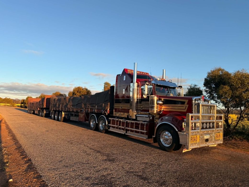 G&S Hannah Transport Kenworth road train parked roadside with tarped bulka bag trailers during the run to Cairns.
