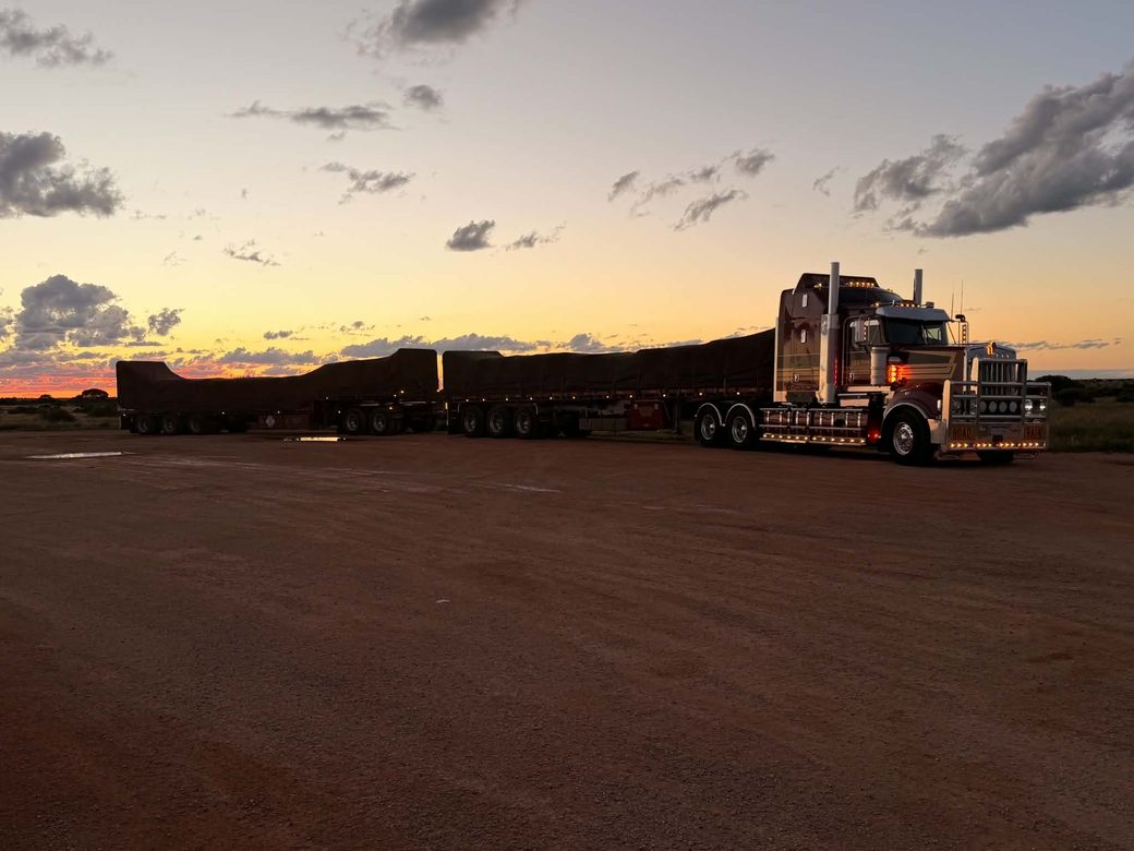 G&S Hannah Transport road train loaded and tarped with bulka bags at sunset, on the Perth to Cairns interstate run.